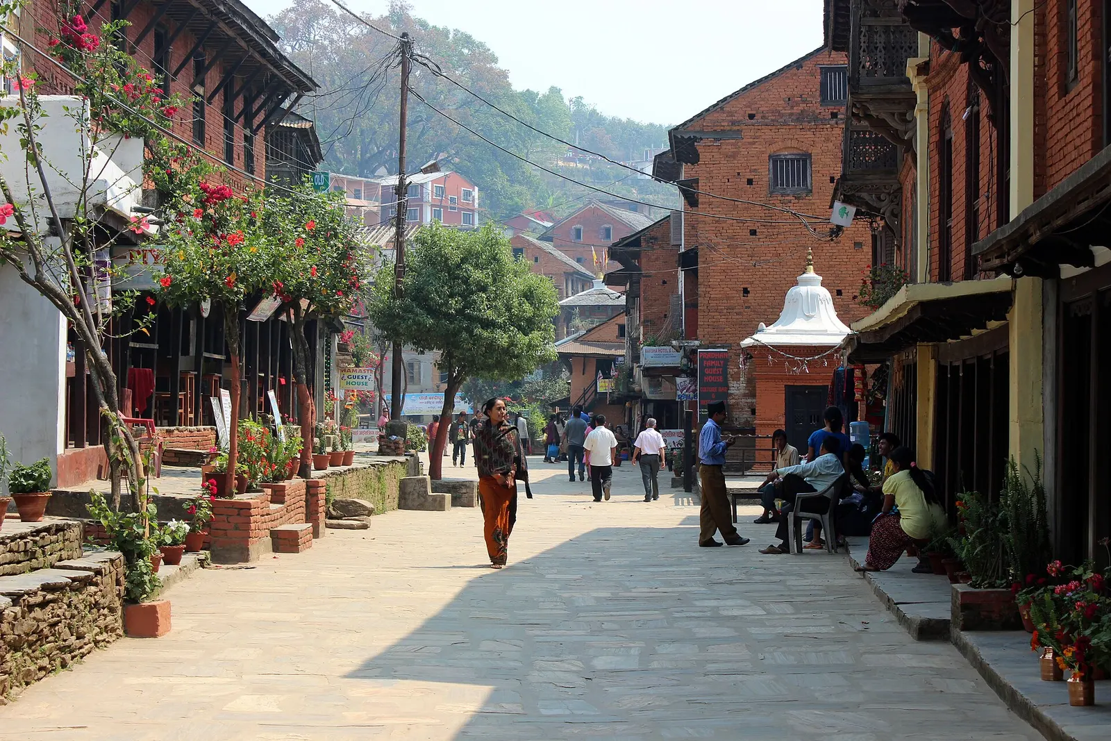The car-free main street of Bandipur lined with old brick Newar houses.