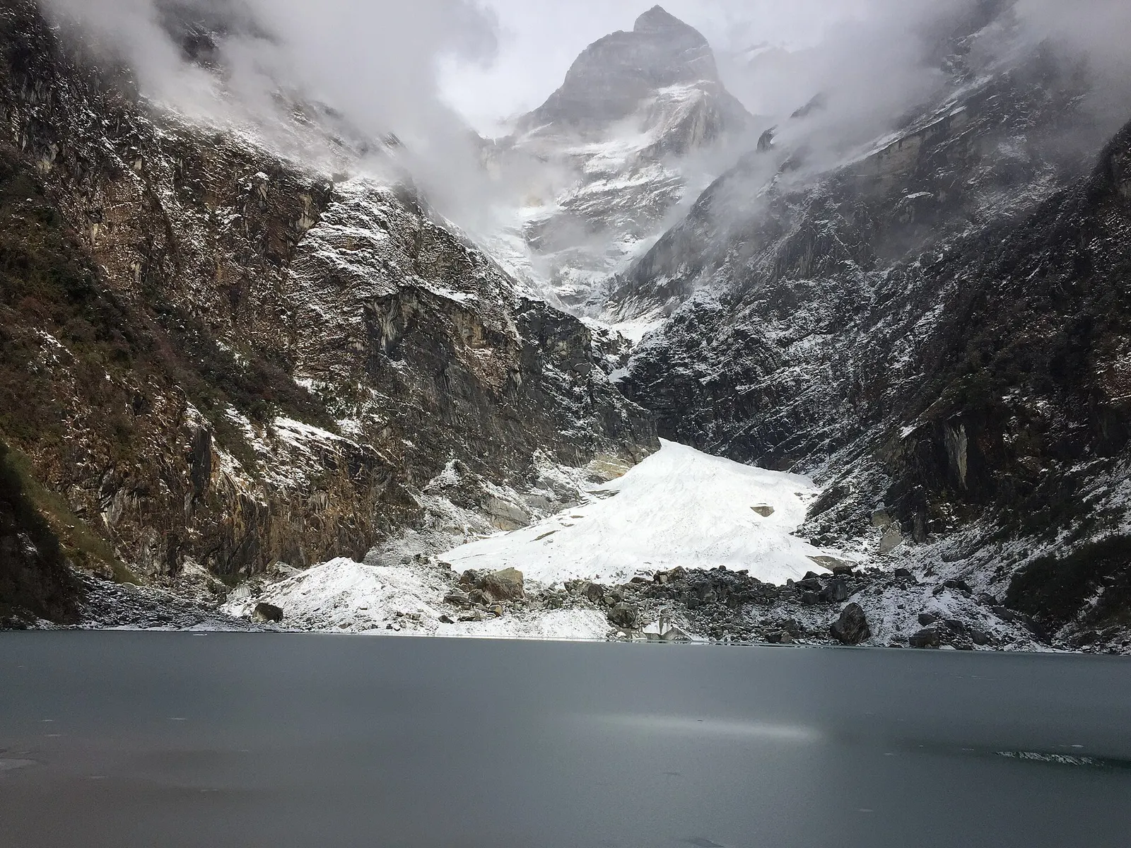 Kapuche Lake beginning to freeze after the first snowfall of the season.