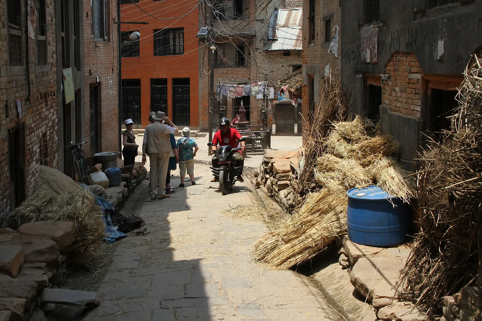 A brick lane between traditional Newar houses in Khokana village.