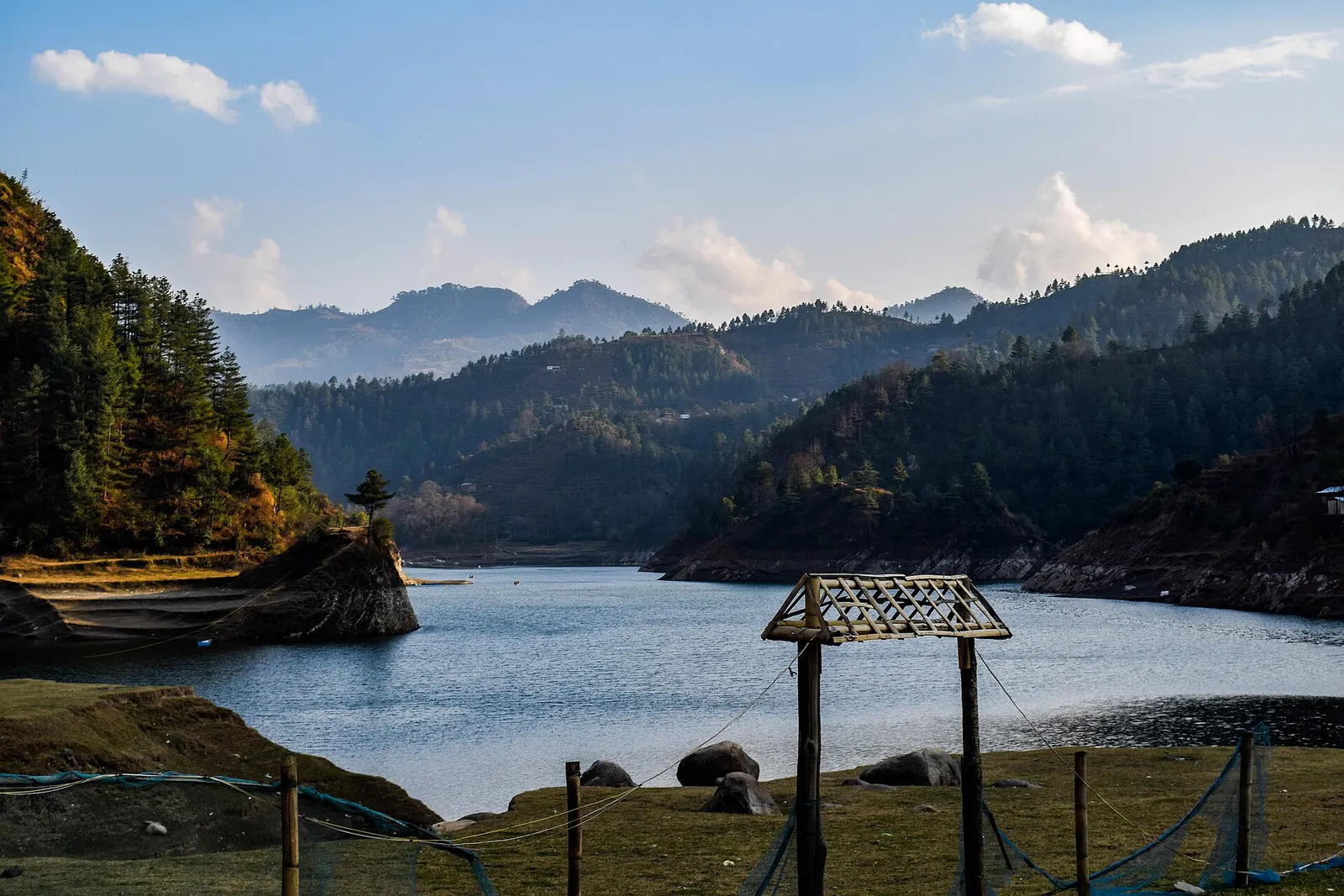 The lake created by the Kulekhani dam surrounded by hills in Makwanpur.