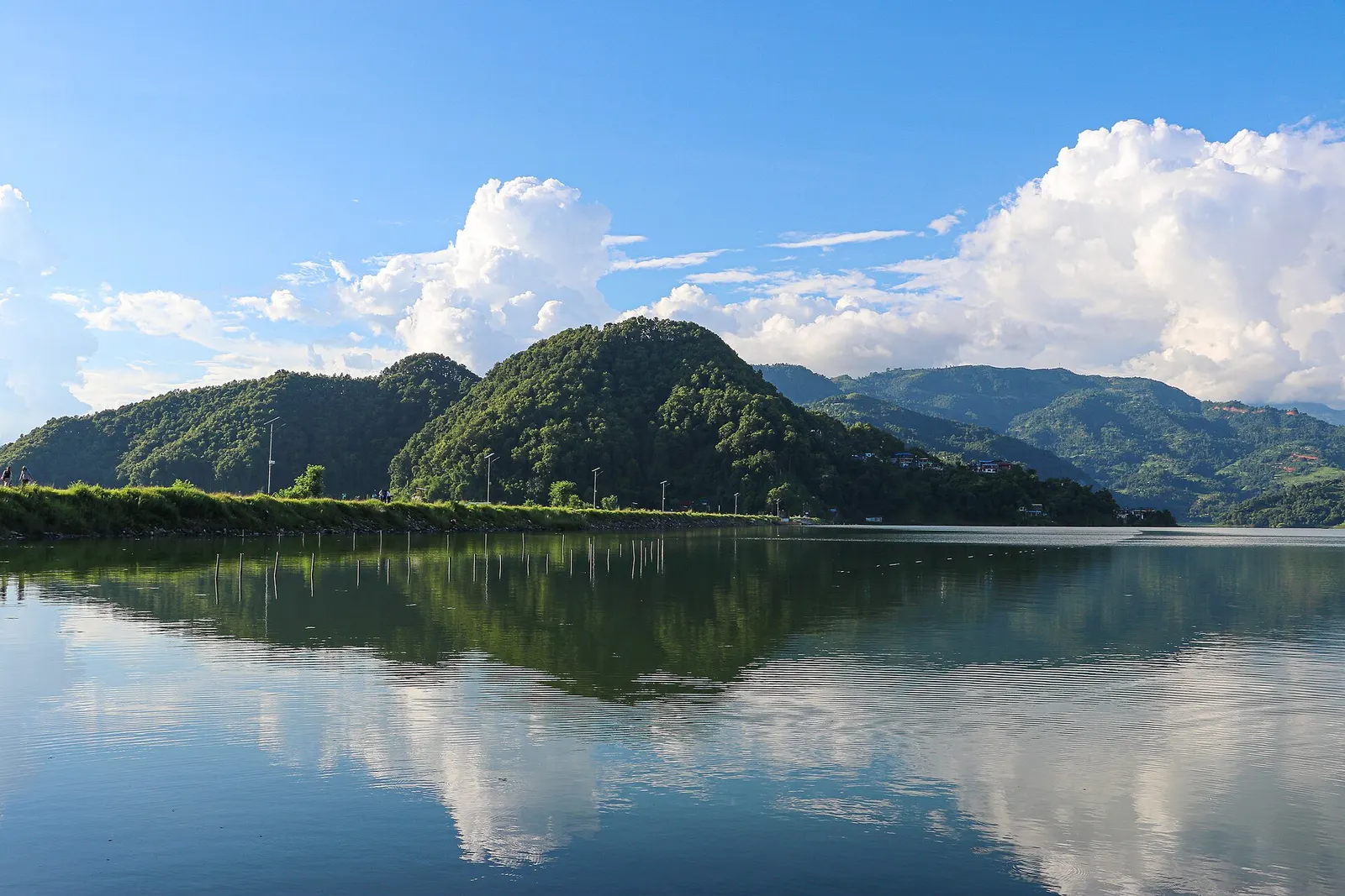 Begnas Lake surrounded by forested hills east of Pokhara.