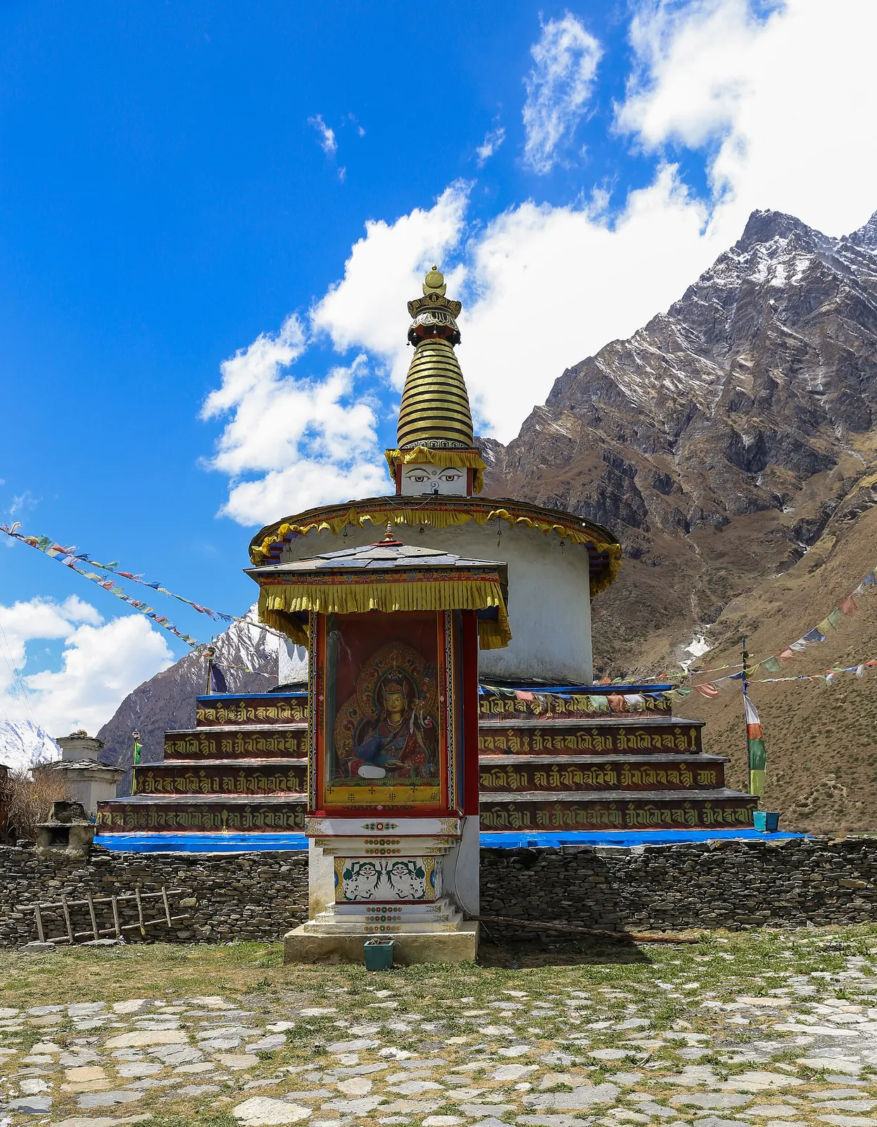 A painted chorten with a gilded spire at Chhule, the village facing Nile in the upper Tsum Valley.